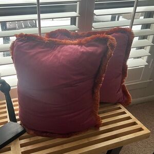 Two custom pink and orange pillows. 18x18
